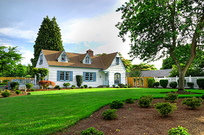Photo of a Home emphasis on the Landscaping